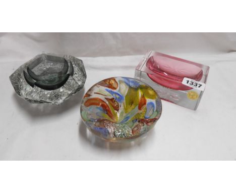 Three pieces of Murano art glass comprising millefiori decorated bowl, textured and cut glass sided bowl and cranberry and cu