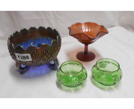 A blue Carnival glass bowl in the 'Fenton's Flowers' pattern - sold with an amethyst bon bon dish and two green glass table s
