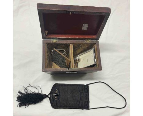 A Victorian tea caddy containing an antique black purse, lady's decorative belt buckle, two brooches, etc.