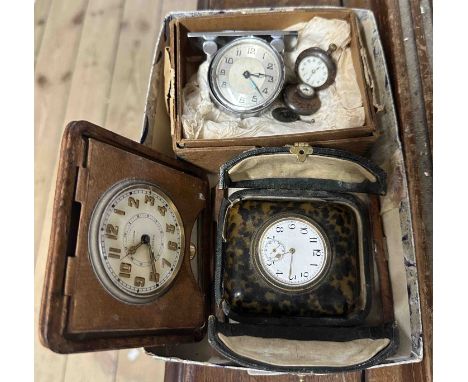 Three old small timepieces, comprising a tortoiseshell clad travelling timepiece with bi-folding outer case, a leather cased 