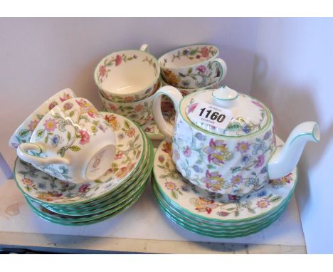 A quantity of Mintons bone china tableware decorated in the Haddon Hall pattern, comprising teapot, six trios, and a tray