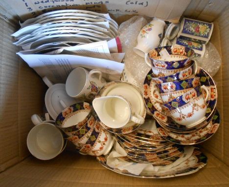 A box containing a quantity of ceramics including collector's plates, Bovey pottery and other commemorative mugs, Wedgwood bo