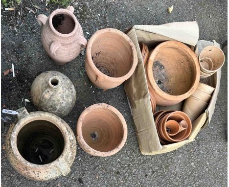A terracotta amphora - sold with an smaller similar, a terracotta urn, a pair of planters and a quantity of terracotta pots