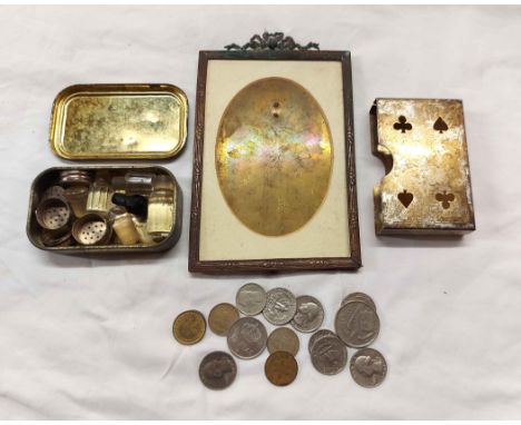 A small quantity of collectable items comprising a Player's Medium Navy Cut tin containing white metal pepperette tops, world