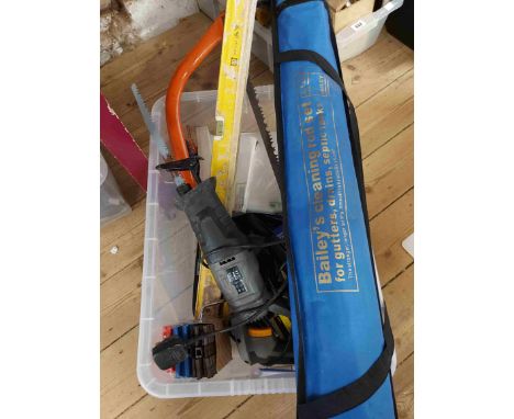 A crate containing a quantity of assorted tools including Titan reciprocating saw, etc. - sold with a quantity of drain rods