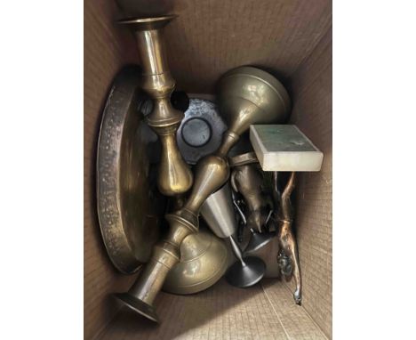 A box containing a quantity of assorted metalware including a pair of two brass candlesticks - sold with a quantity of stainl