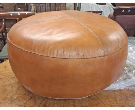 A large modern Indian stitched tan leather pouffe