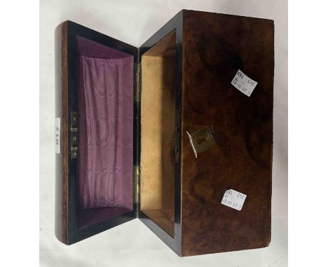 A walnut dome-top tea caddy with monogrammed brass cartouche to lid