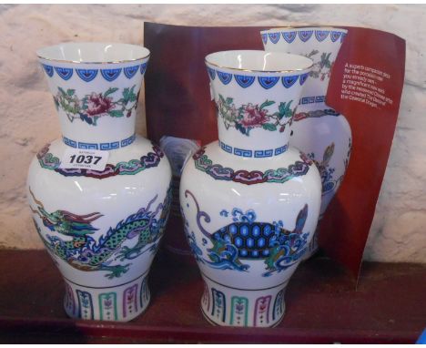 Two late 20th Century Franklin Mint Chinese porcelain vases from a design by Chien-Ying May, one depicting the dance of the c
