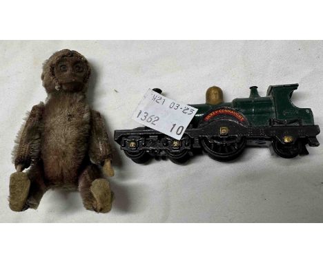A miniature vintage Schuco toy monkey - sold with a Lesney Duke of Connaught model steam train