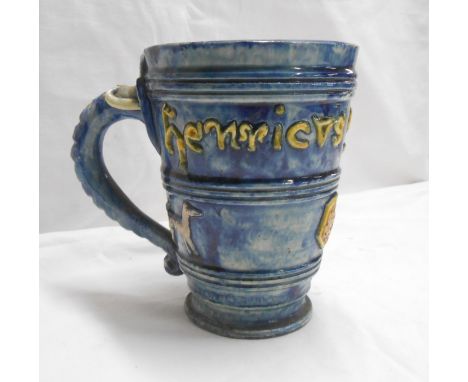 An early 20th Century Edward Binham Castle Hedingham art pottery mug, made as a reproduction of a medieval tankard with appli