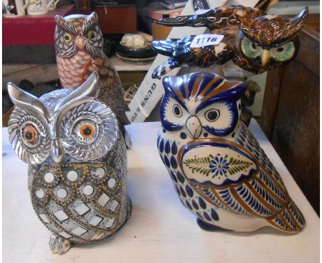 Four ceramic and other owl figurines