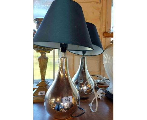 A pair of modern silver glazed ceramic table lamps with shades