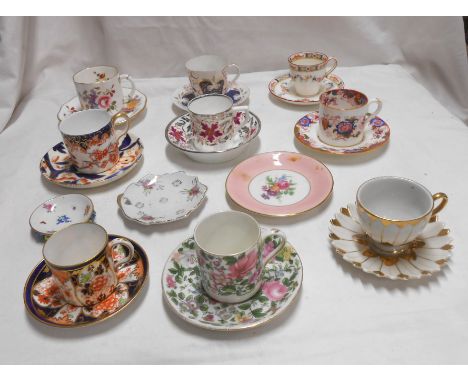 A quantity of bone china cups and saucers including Copeland, Wedgwood, etc.