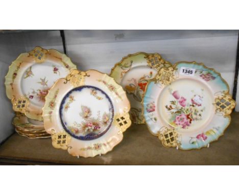 Eight late 129th Century Carltonware plates with floral decoration and pierced rims