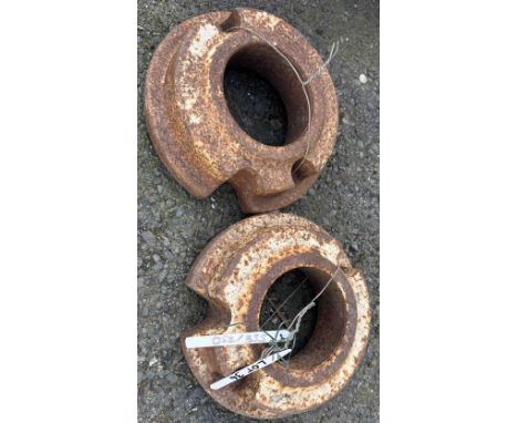 Two cast iron tractor weights