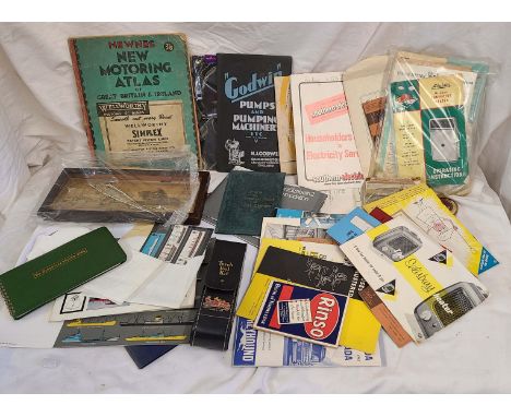 A collection of assorted vintage paper ephemera, publications, guides and instructions for various items including pumping ma