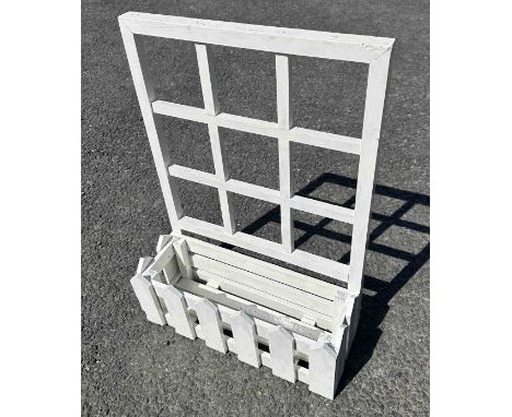 A white painted wood plant stand