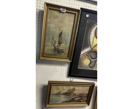 Two similarly gilt framed early 20th Century oils on canvas, one depicting sailing fishing vessels, the other coastal rocks