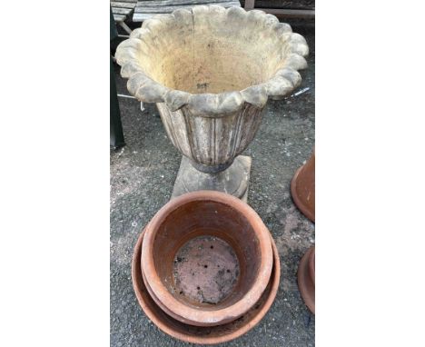 A campana pot - sold with three terracotta pots -&nbsp;weathered condition