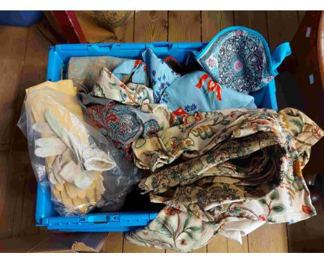 A crate containing a large quantity of assorted vintage and later clothing and textiles