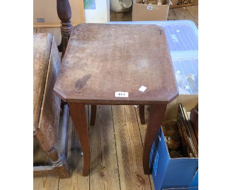 An old mahogany tea table with moulded edge, set on swept legs