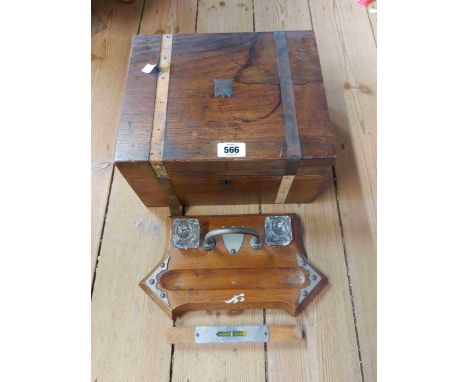 An antique oak desk stand with twin glass inkwells - sold with a writing slope and a small spirit level