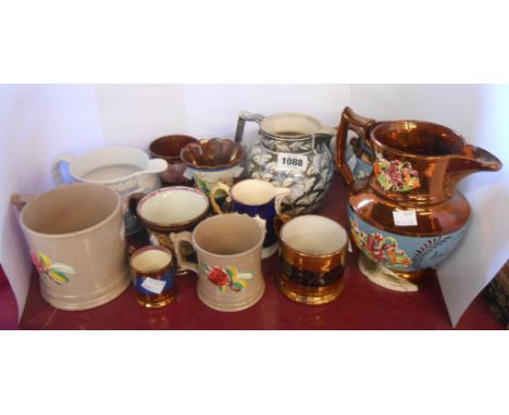 A quantity of 19th Century Staffordshire and other lustre decorated jugs, mugs and cups including silver resist jug, frog mug