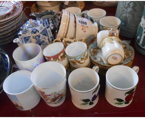 A quantity of ceramics including Limoge porcelain coffee cups and saucers, Bovey pottery style fruit decorated mugs, etc.