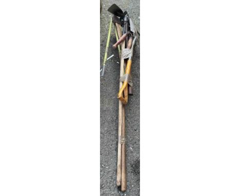 A quantity of garden tools including spade, shovel, etc.