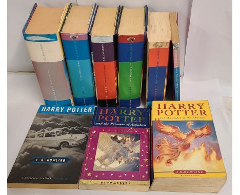 Harry Potter by J.K. Rowling: four hardback first editions, all with printed dust jackets - sold with five paperback volumes