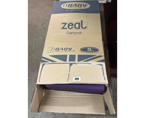A boxed purple O-baby Zeal carry cot