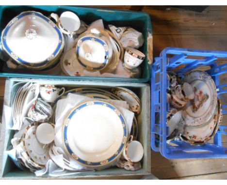 A wooden box, a vintage 'Express Dairies' milk crate and another crate containing a quantity of Wedgwood &amp; Co tableware a