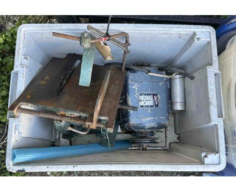 A Newman saw bench head and motor