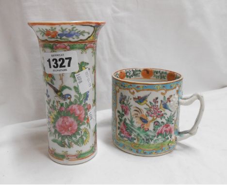 An antique Chinese porcelain mug with famille rose panelled decoration, depicting exotic birds amidst foliage on a turquoise 