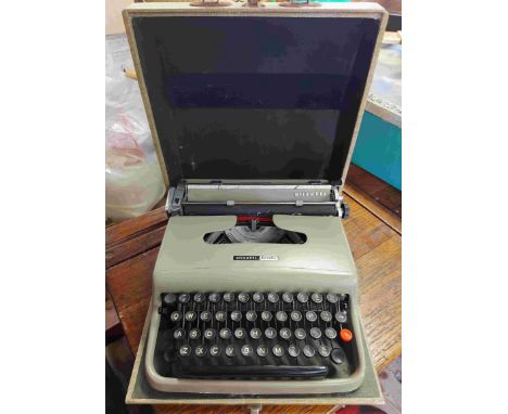 A vintage cased Olivetti 'Scribe' typewriter