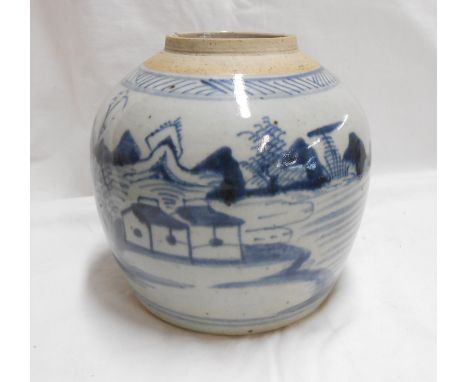 An antique Chinese pottery ginger jar with blue painted landscape decoration - no lid