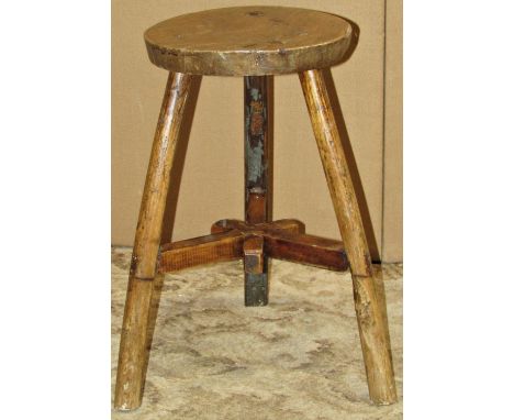 An Edwardian mahogany occasional table in the Chippendale manner, square cut with column supports, together with rustic stool