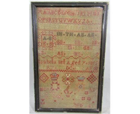 An early 19th century needlework sampler by Isabella Bell aged seven, dated 1815, 44 x 26cm approx, framed 