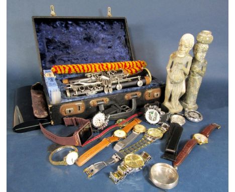 Cased ebonised clarinet together with two tribal figures, and a collection of gent's fashion wrist watches (collection) 