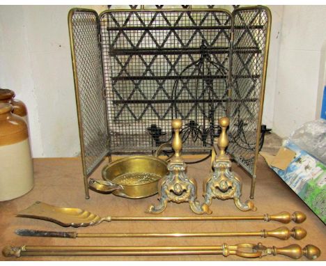 An ironwork six branch hanging ceiling light/chandelier with candle sockets together with a set of three brass fire irons, pa