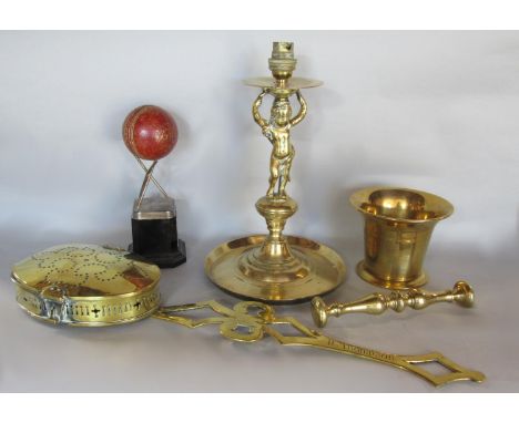 A mixed collection of glassware to include a cast brass table lamp in the form of a cherub, a chestnut roaster, and a pestle 