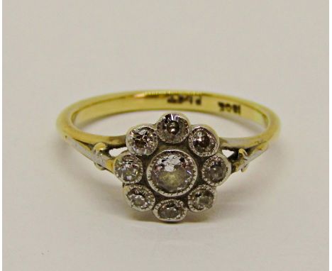 Good quality antique 18ct and platinum diamond daisy cluster ring, centre diamond 0.20cts approx, size K/L, 2.6g 