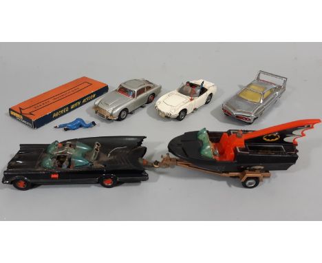 Small collection of unboxed model vehicles relating to TV programmes including a Corgi Batmobile towing Bat Speedboat on trai