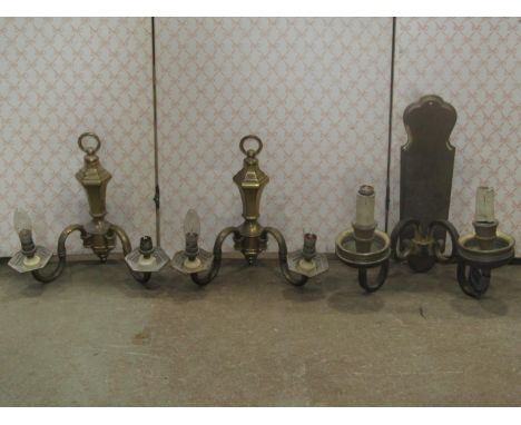 Neo-classical style cast gilt metal two branch wall light with tied ribbon, swag and acanthus detail together with a further 
