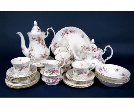 A collection of Royal Albert Lavender Rose pattern wares comprising teapot, coffee pot, milk jug, sugar bowl, cake plate, fiv