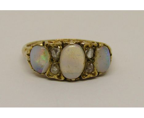 Yellow metal opal and rose cut diamond ring, size R, 3.8g 
