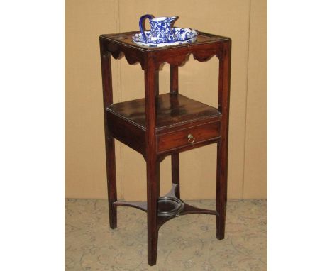 A Georgian mahogany square cut wash stand of usual form, together with a blue and white jug and basin 