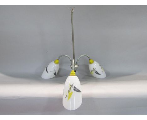 1950s three branch ceiling light with shaped glass shades with abstract decoration, 50 cm in total height 