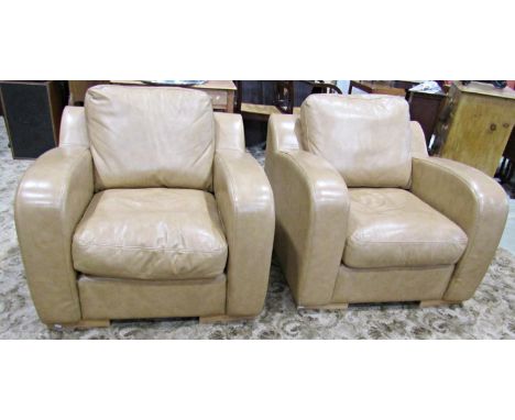 A pair of contemporary Art Deco style light beige coloured stitched leather upholstered club armchairs 